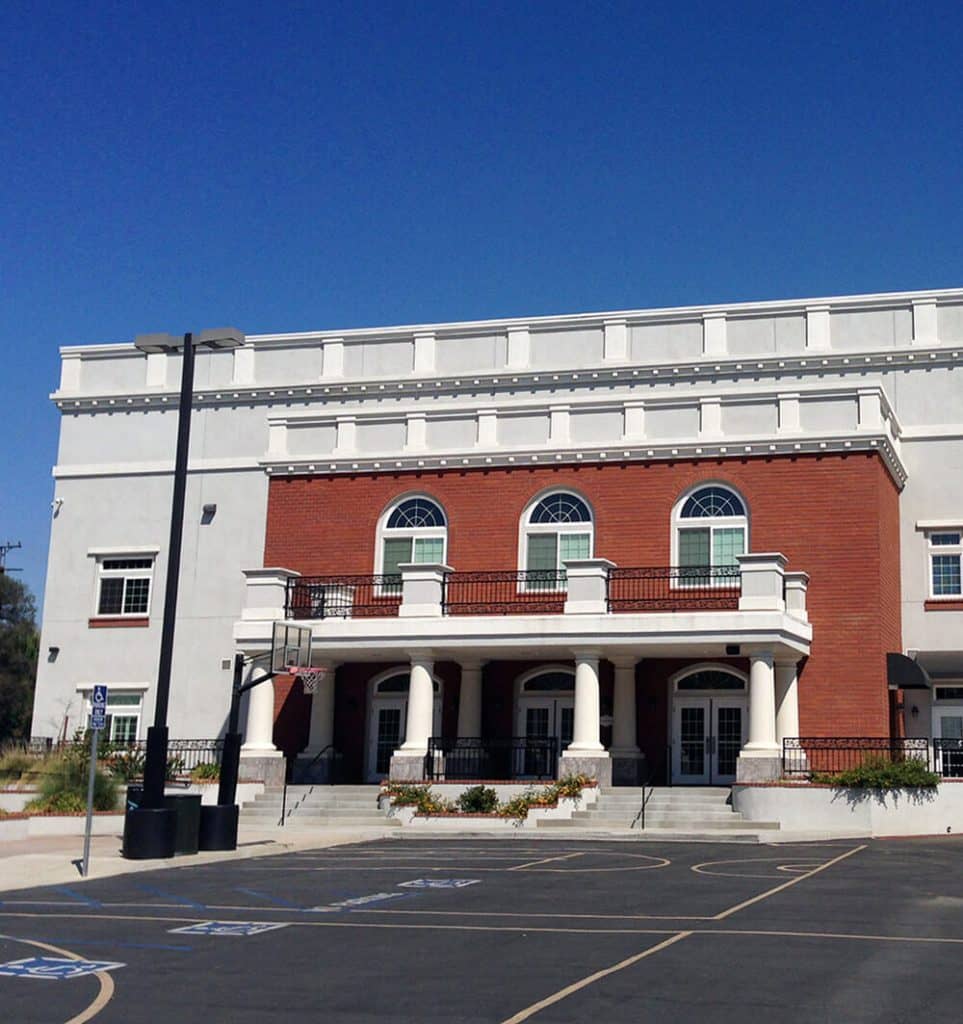 The lighthouse baptist church stands against deep blue skies