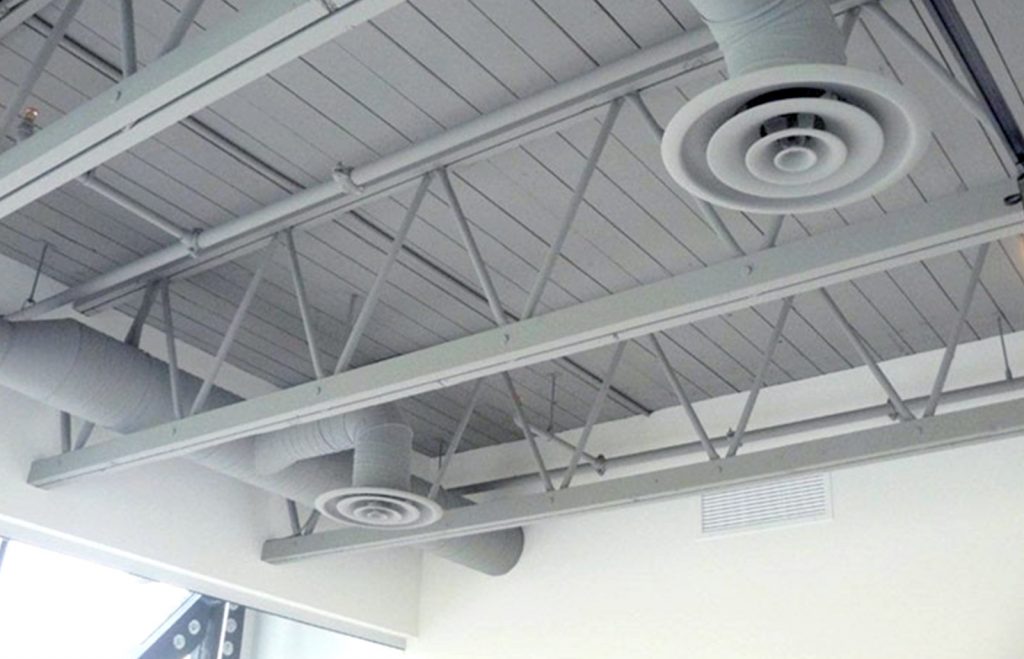Installing Exposed Trusses And Solving A Skylight Dilemma