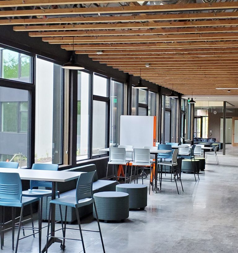School cafeteria with open web truss ceiling