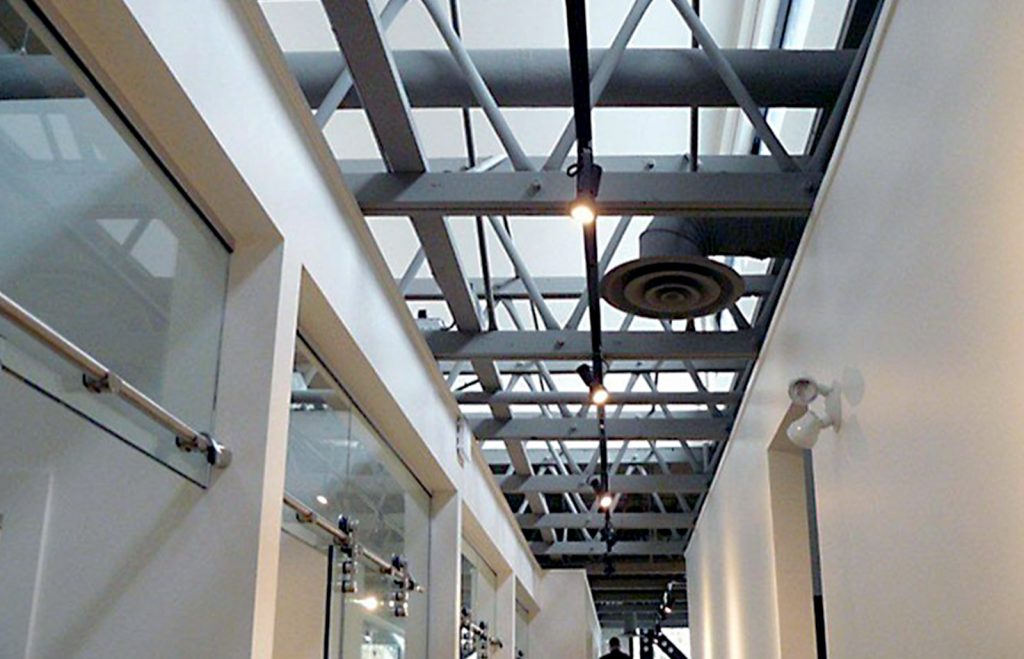 Installing Exposed Trusses And Solving A Skylight Dilemma
