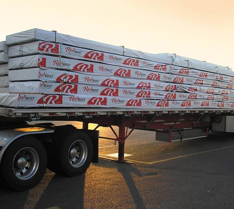 RedBuilt products wrapped and sitting on a trailer bed ready to be shipped