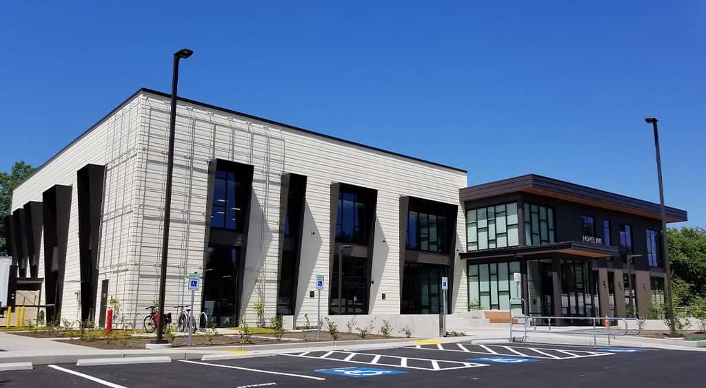 The entire Hopelink building is shown in morning sunlight