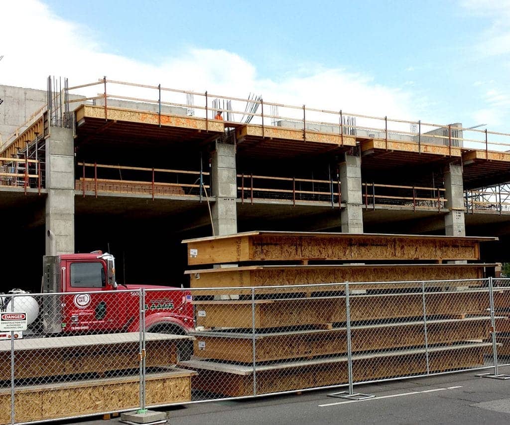 A simple parking garage structure stands ready for the next phase of a concrete forming project