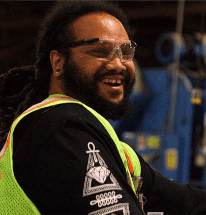 A RedBuilt employee laughs in one of our manufacturing facilities