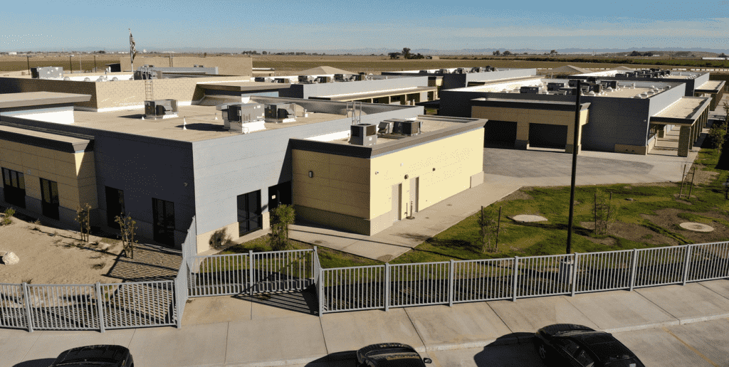 A school in California with yellow and gray paint