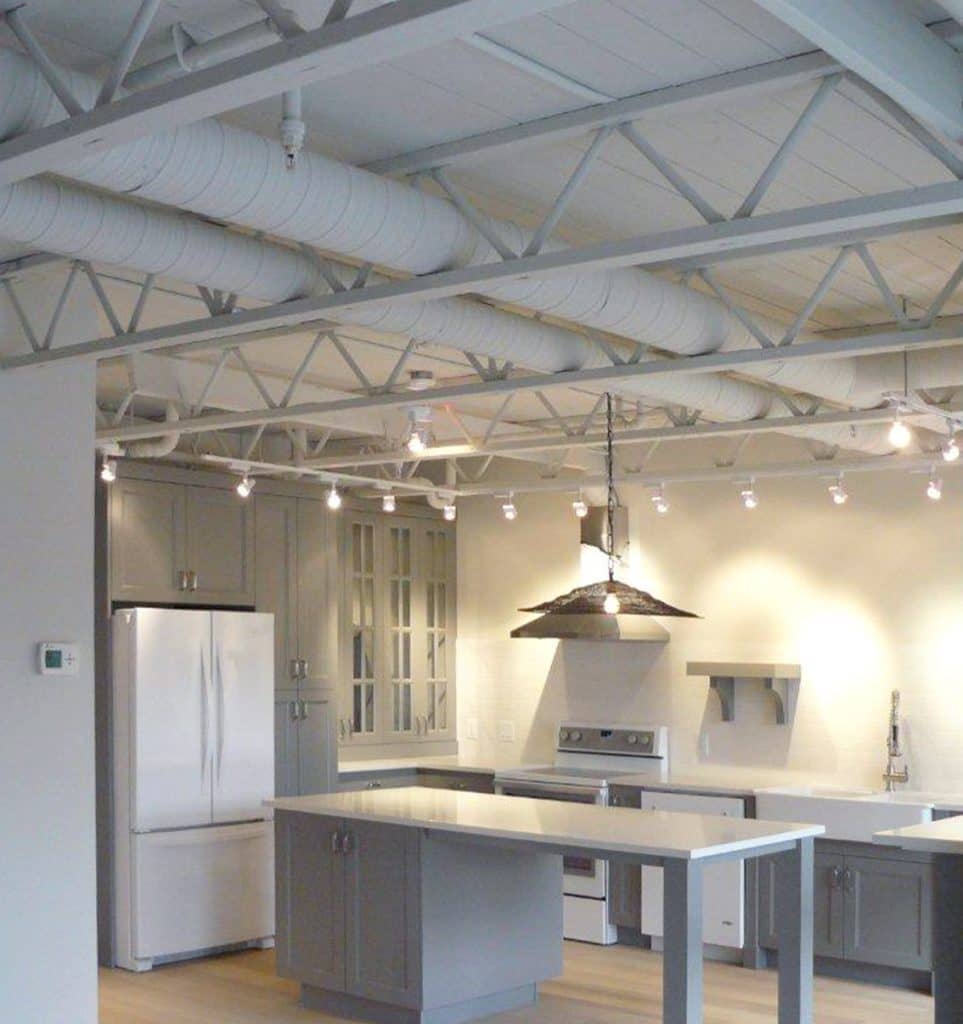 A modern kitchen with roof trusses