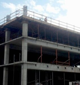 A parking garage with concrete forming in the works