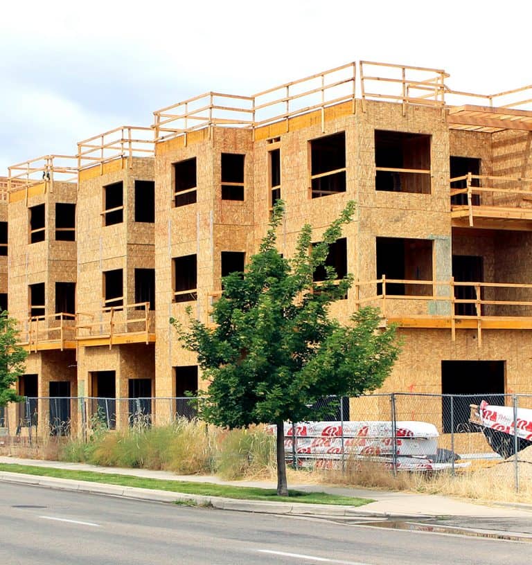 A wood building with RedBuilt products nearby