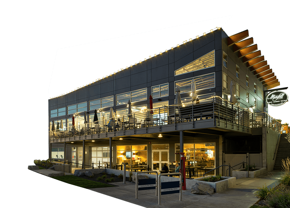 Exterior of a restaurant building lit up at night