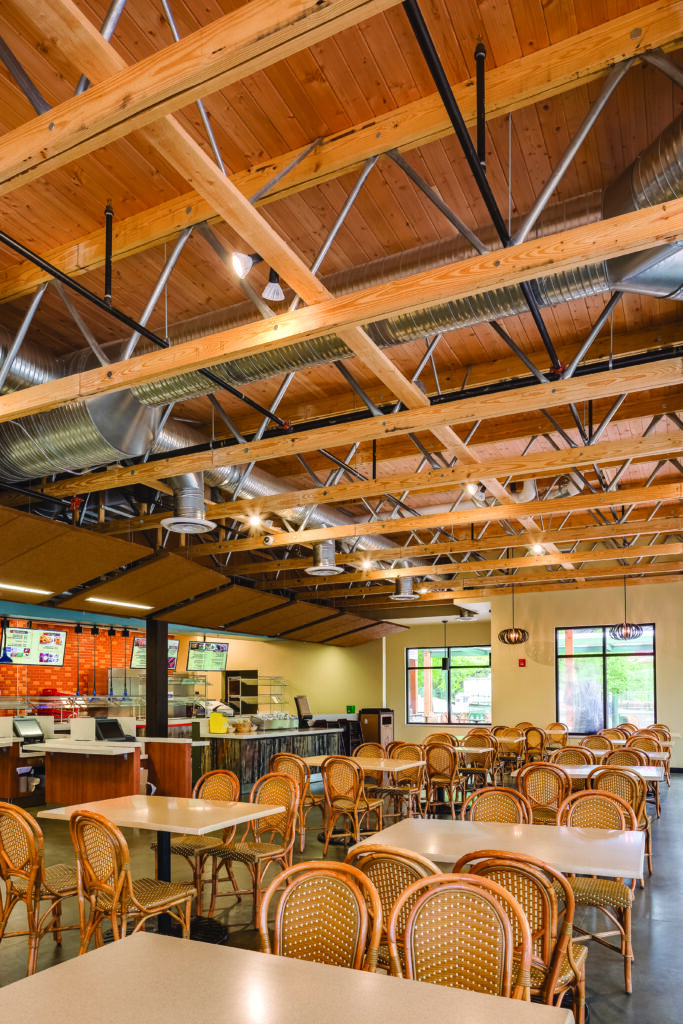open web trusses exposed in a cafe